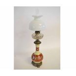 Good quality French glass oil lamp with a Grecian designed body and central panels raised on a brass
