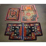 Collection of four various late 20th century saddle bag rugs, all approx 64cm wide