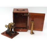 Late 19th/early 20th century monocular microscope, the black painted and lacquered brass body with