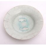 Chinese porcelain shallow bowl with slight foliate rim, decorated in a pale crackled celadon