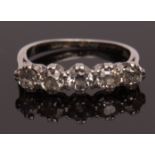 Precious metal five-stone diamond ring, line set with five single cut diamonds, approx 0.60ct, all