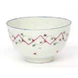 Lowestoft teabowl, circa 1790, decorated in enamels with a zig-zag pink enamel line interspersed