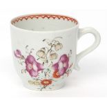 Lowestoft cup, circa 1780, decorated in typical style by the Tulip painter beneath a red line and