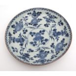 Chinese blue and white porcelain shallow dish decorated in Ming style with floral sprays, 27 1/2cm