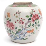 Chinese porcelain pot decorated in famille rose enamels with peony and other blossom amidst rock