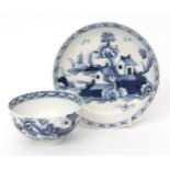 Lowestoft teabowl and saucer, circa 1770, painted in underglaze blue with a chinoiserie design of