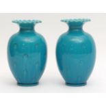 Rare pair of late 19th century Burmantofts baluster vases decorated with a streaked turquoise