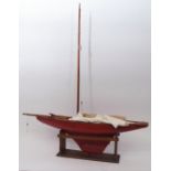 Early 20th century timber built and painted pond yacht, with varnished timber decks and red