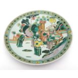 Chinese porcelain charger decorated in colourful enamels with nobles, probably the Emperor,