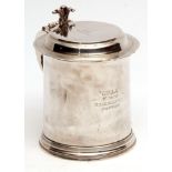 Edward VII lidded tankard, the hinged cover with cast and applied scrolling thumb piece and engraved