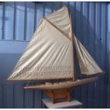 Early 20th century timber built large proportioned racing pond yacht, with a white painted and