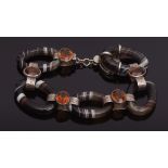 Late 19th century banded agate and citrine bracelet, comprising 5 oval agates joined by 5 collet set
