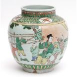 Chinese famille vert porcelain jar decorated with children playing in a garden setting, 20cm high