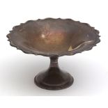 George V pedestal bowl of shaped circular form with polished field and raised on a spreading