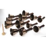 Cased set of 19th century campanologist's brass and leather hand bells, each of typical form with