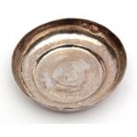 Middle Eastern white metal serving bowl of circular form with chased and engraved decoration and