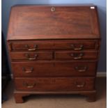 George III period mahogany bureau fall front, fitted interior with well, five drawers below on