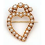 Late 19th/early 20th century heart shaped seed pearl brooch of open work design having 20 uniform