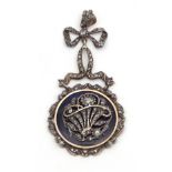 Blue enamel and diamond pendant, the circular plaque enamelled in royal blue, overlaid with a
