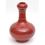 Chinese porcelain bottle vase with heavy all-over mottled red glaze, 6 character Yongzheng mark in