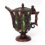 19th century French Palissy or Avignon style covered ewer, the brown glazed pottery body with