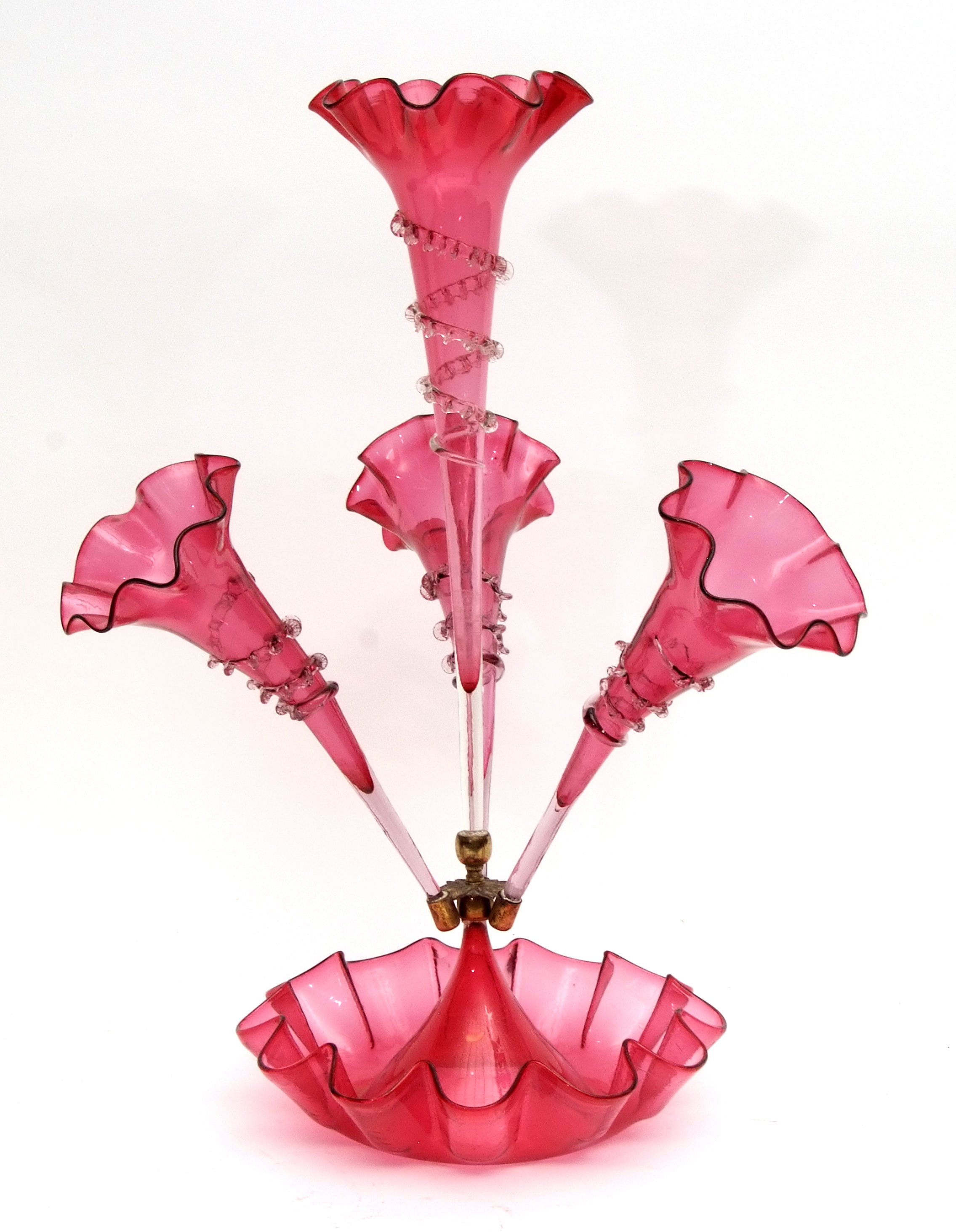 Victorian cranberry glass four-flute epergne, each flute with a crimped rim and with clear glass