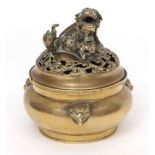 Chinese bronze censer and cover, the body with three animal mask handles, the lid surmounted by a