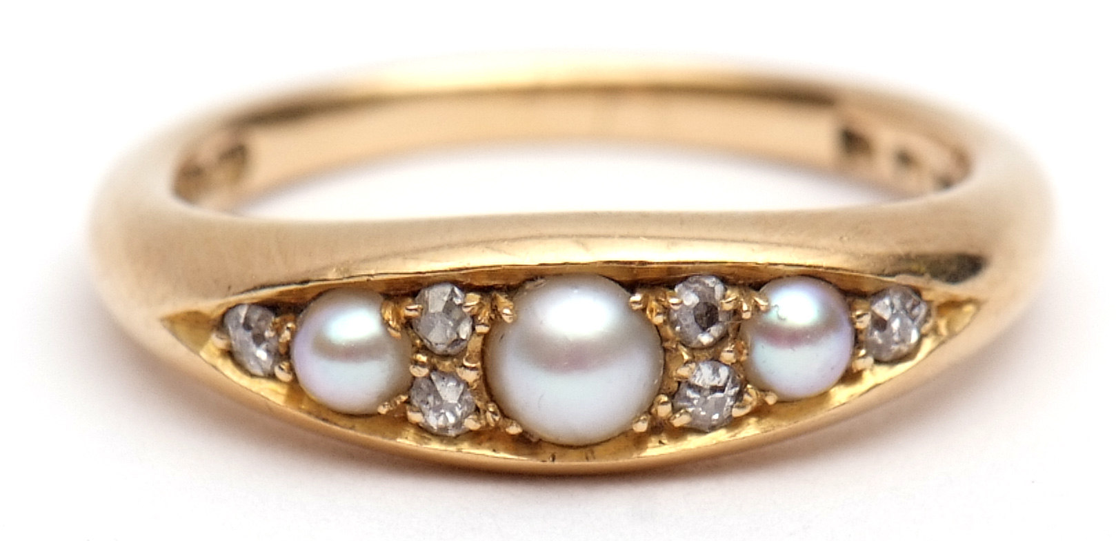 18ct gold split pearl and diamond ring, boat shaped with three graduated split pearls,