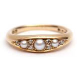 18ct gold split pearl and diamond ring, boat shaped with three graduated split pearls,