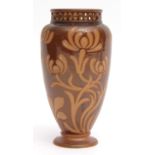 Late 19th century Doulton Lambeth stoneware vase, the dark brown body with applied buff decoration