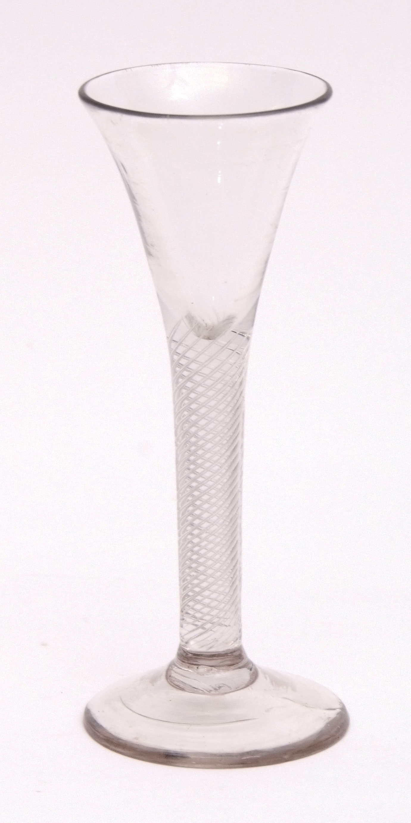 18th century wine glass with conical bowl, latticinio stem and spreading circular foot, 17cm high