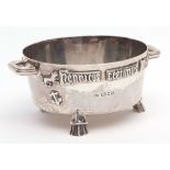 George V silver reproduction of the "Winchester Bushel" bowl, of hammered circular form with cast