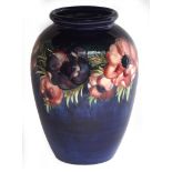 Impressive Moorcroft vase decorated with anemones on a blue ground, circa mid-20th century, 34cm