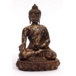 Chinese gilt lacquer bronze Buddha seated upon a lotus base, a censer in his left hand and a