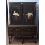 18th century and later black lacquered cabinet on stand, the upper section with doors painted with