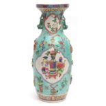 Large Chinese porcelain vase with relief moulded decoration in famille rose enamels, showing