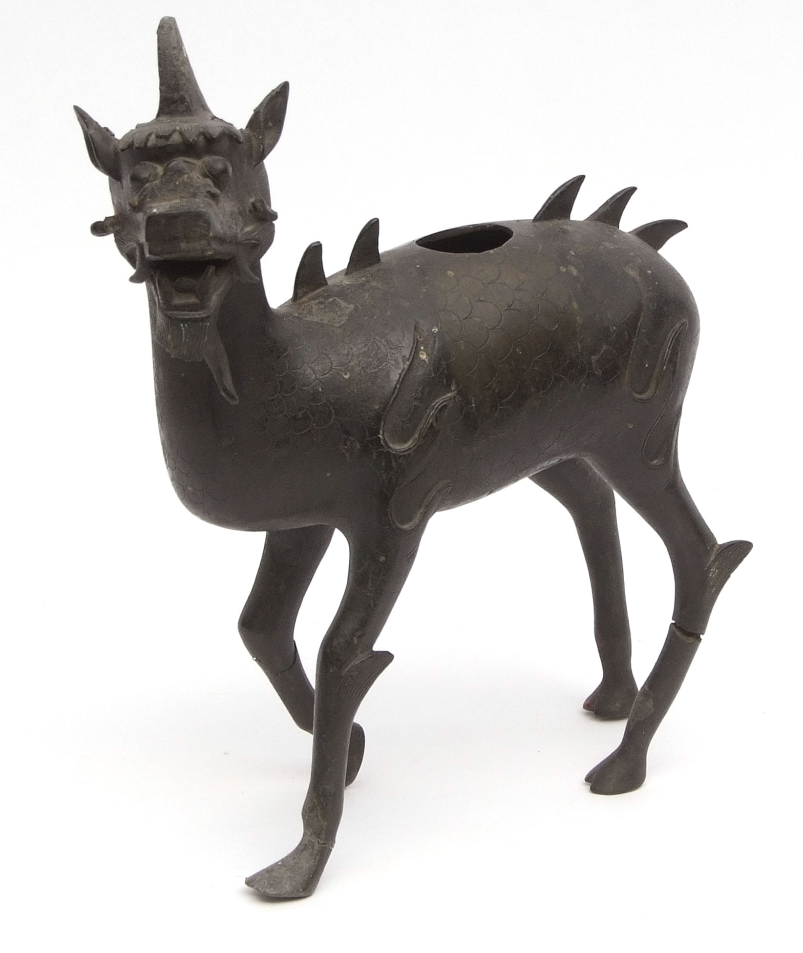 Chinese bronze censer in the form of a standing Kylin typically cast with scaly deer's body and