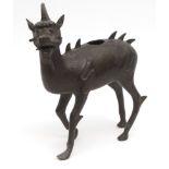 Chinese bronze censer in the form of a standing Kylin typically cast with scaly deer's body and