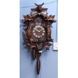 Late 19th century "Black Forest" wall mounting cuckoo clock, the architectural case with a