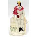 19th century Staffordshire figure of Dick Whittington brightly coloured with yellow hat and pink