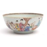 Chinese porcelain bowl decorated in vibrant famille rose enamels with courtiers, possibly the