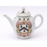 An extremely rare and important Lowestoft armorial teapot or punch pot and cover, circa 1780, the