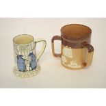 Royal Doulton Lambeth two-tone tankard with three handles, with raised decoration, together with a