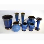 Collection of 8 blue glazed Bourne Denby wares to include a pair of tapering vases with single