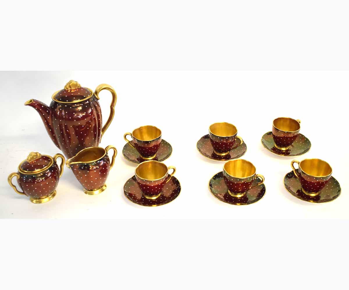 Carlton ware rouge and white polka dot decorated tea set comprising six cups and saucers, a two-