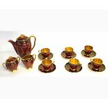 Carlton ware rouge and white polka dot decorated tea set comprising six cups and saucers, a two-