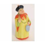 Royal Worcester candle snuffer modelled as an Oriental figure, with printed mark to base, 10cms tall