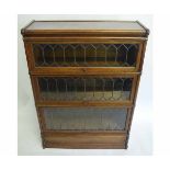 Early 20th century oak framed three-sectional Globe Wernick bookcase with leaded and glazed