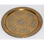 Eastern etched brass and copper inlaid circular tray with geometric design, 35cms diam