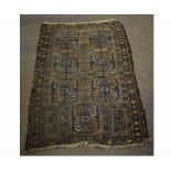 Bokhara style small prayer rug with a brown ground with geometric lozenges, 85cms wide x 135cms long